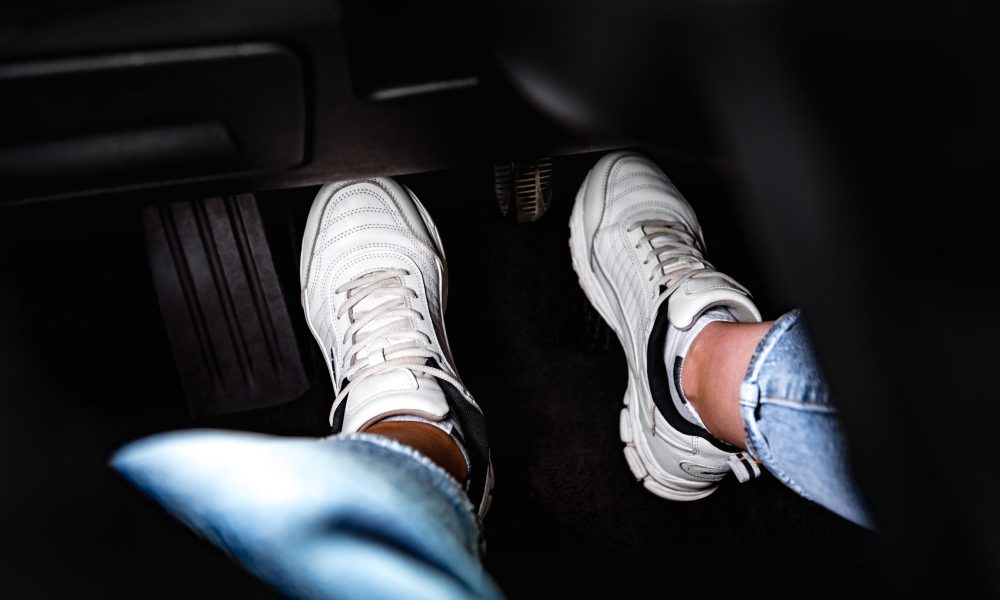 Human,Feet,Pressing,Car,Pedal.